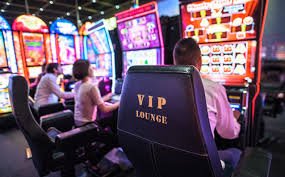 Live roulette table with dealer spinning the wheel